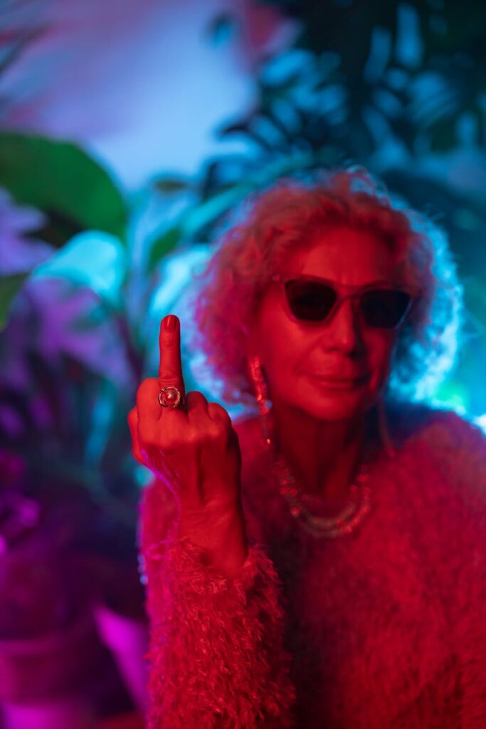 photo of elderly woman wearing sunglasses